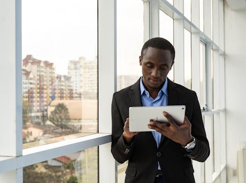 Businessman Using Tablet