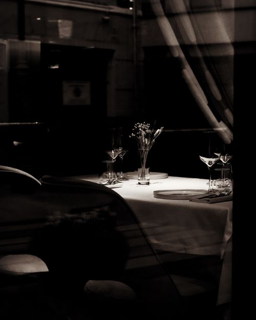Free Luxurious black and white dining setup, perfect for a romantic evening. Stock Photo