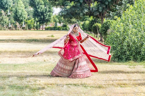 Bride in Traditional Dress in Countryside