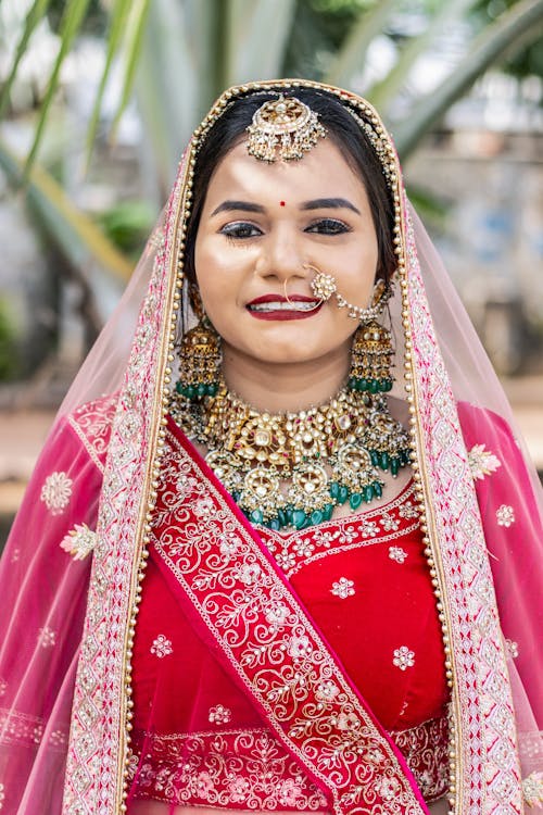 Bride Wearing Traditional Jewelry and Dress