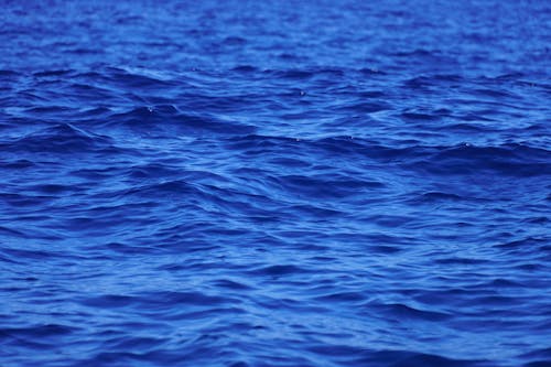 Ripples and Waves on a Blue Sea Surface