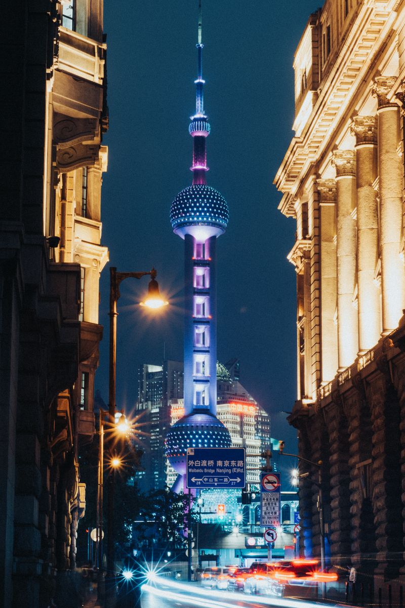 Illuminated Oriental Pearl Tower at night seen from the Bund, Shanghai