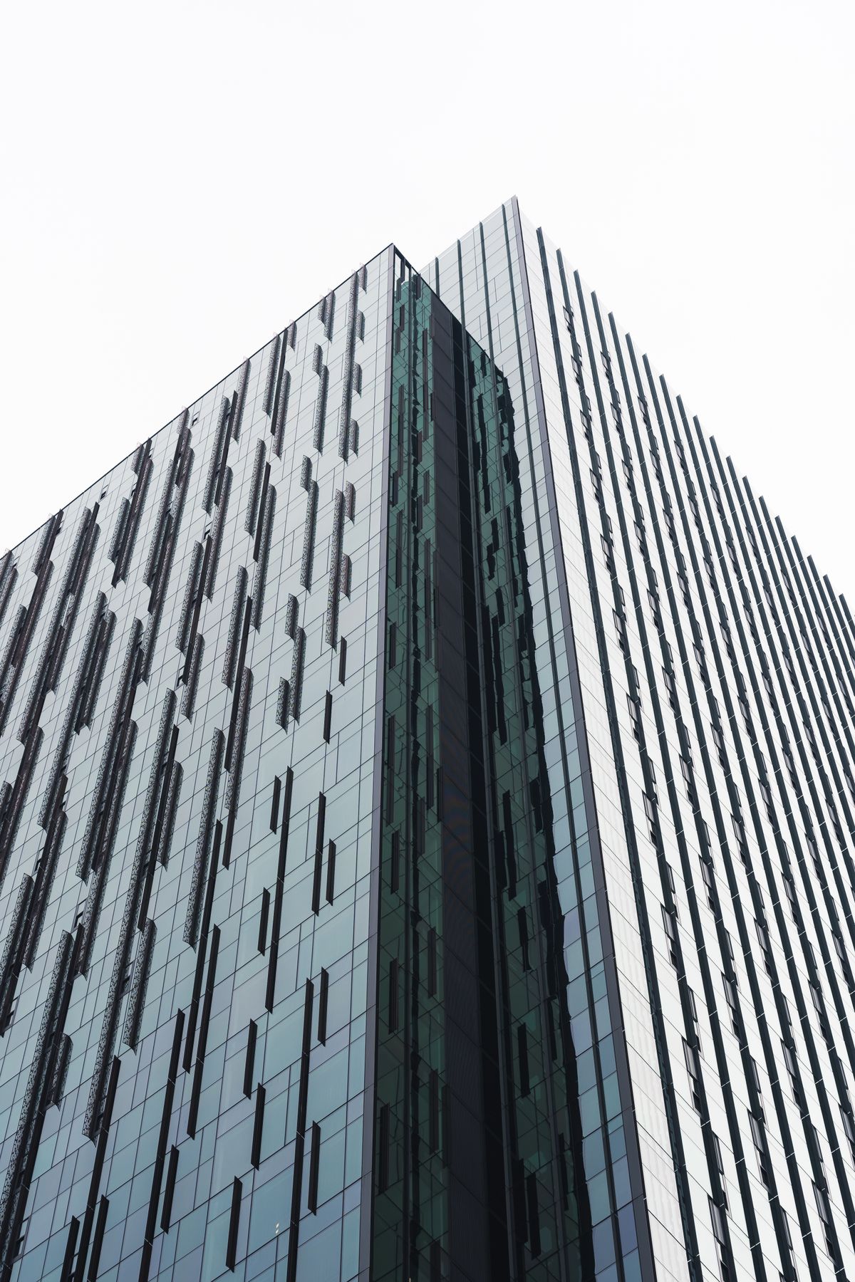 Modern Glass Skyscraper against Blue Sky · Free Stock Photo