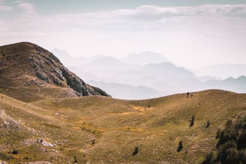 Free Breathtaking view of mountains and valleys in Montenegro on a misty day. Stock Photo