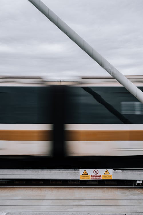 Blurred Train Cars Rushing over the Golden Horn Metro Bridge