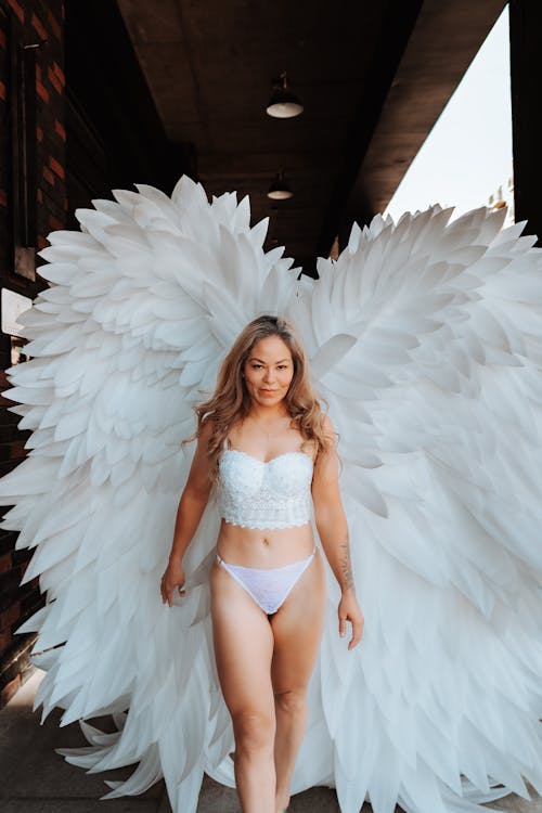 Woman with Wings Posing in Lingerie