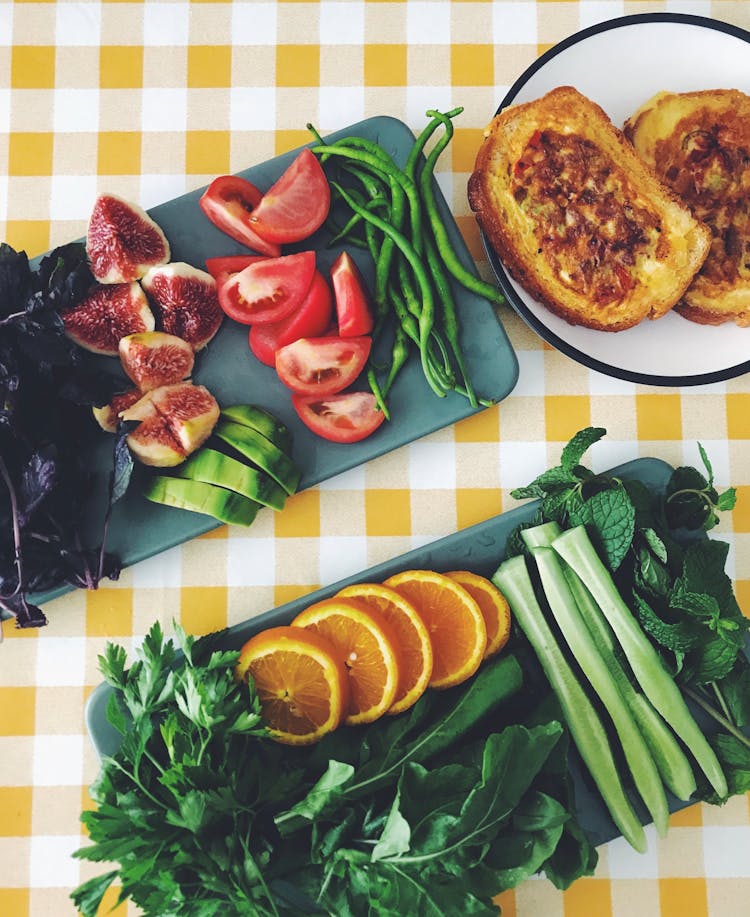 Fruit And Vegetables Near Plate With Bread