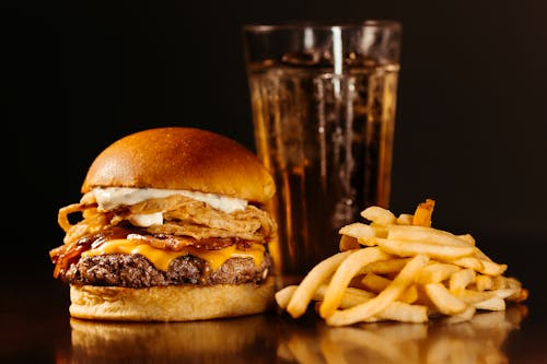 Hamburger and French Fries Served in a Restaurant