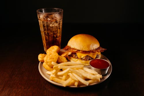 Hamburger and French Fries Served in a Restaurant