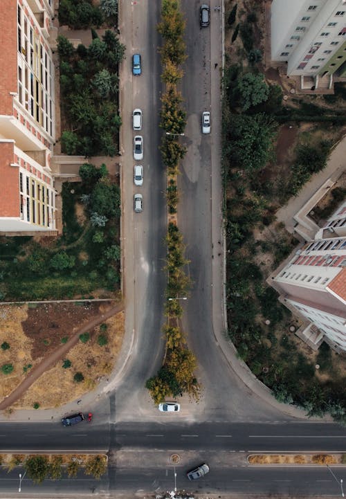 Cars Riding on a Street Seen From Above