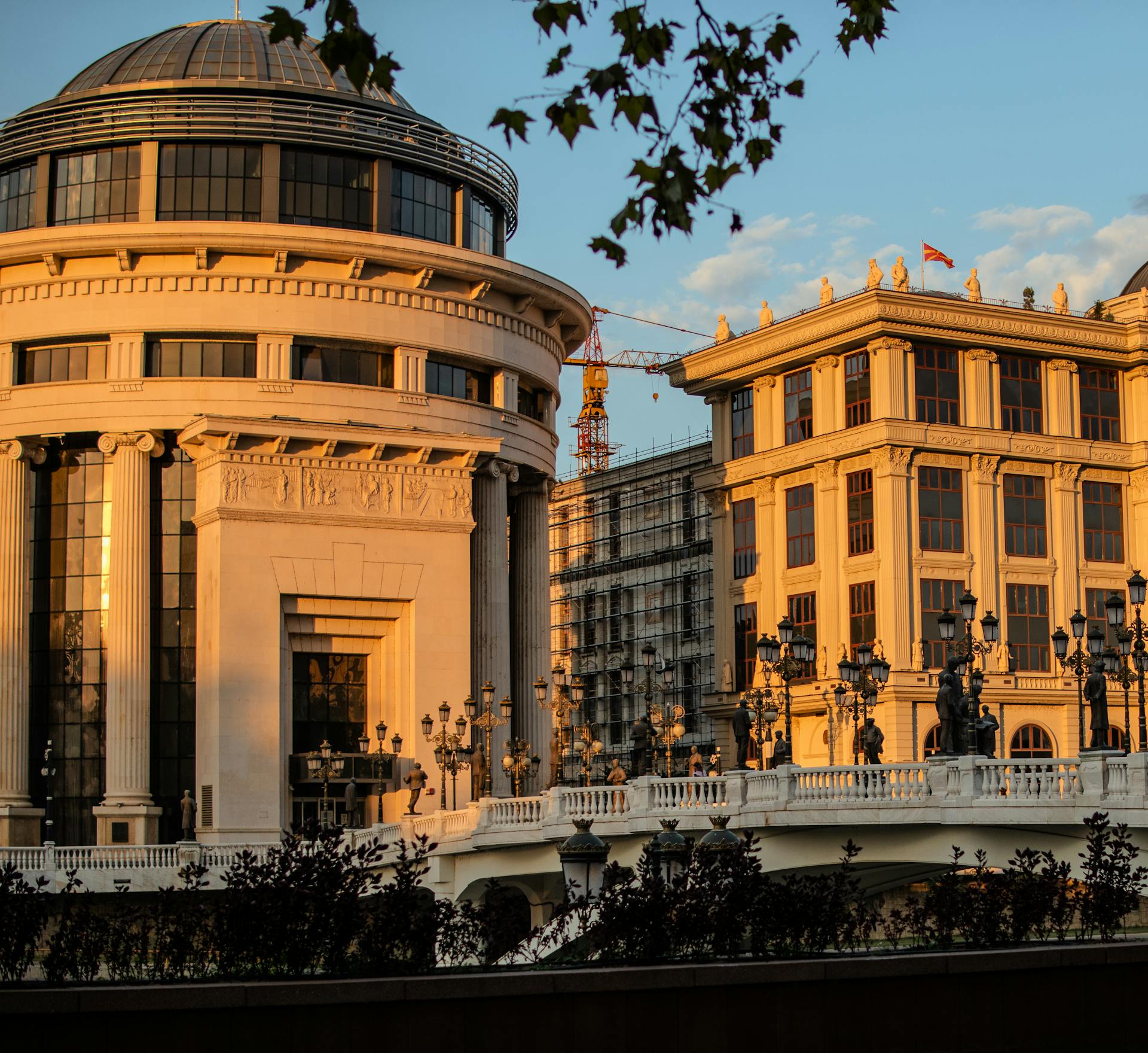 A stunning view of architectural buildings bathed in sunlight in Skopje, North Macedonia.