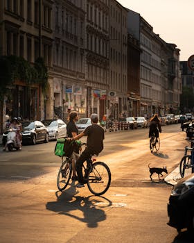 Cyclists navigating a lively street in Berlin, capturing the essence of urban life.