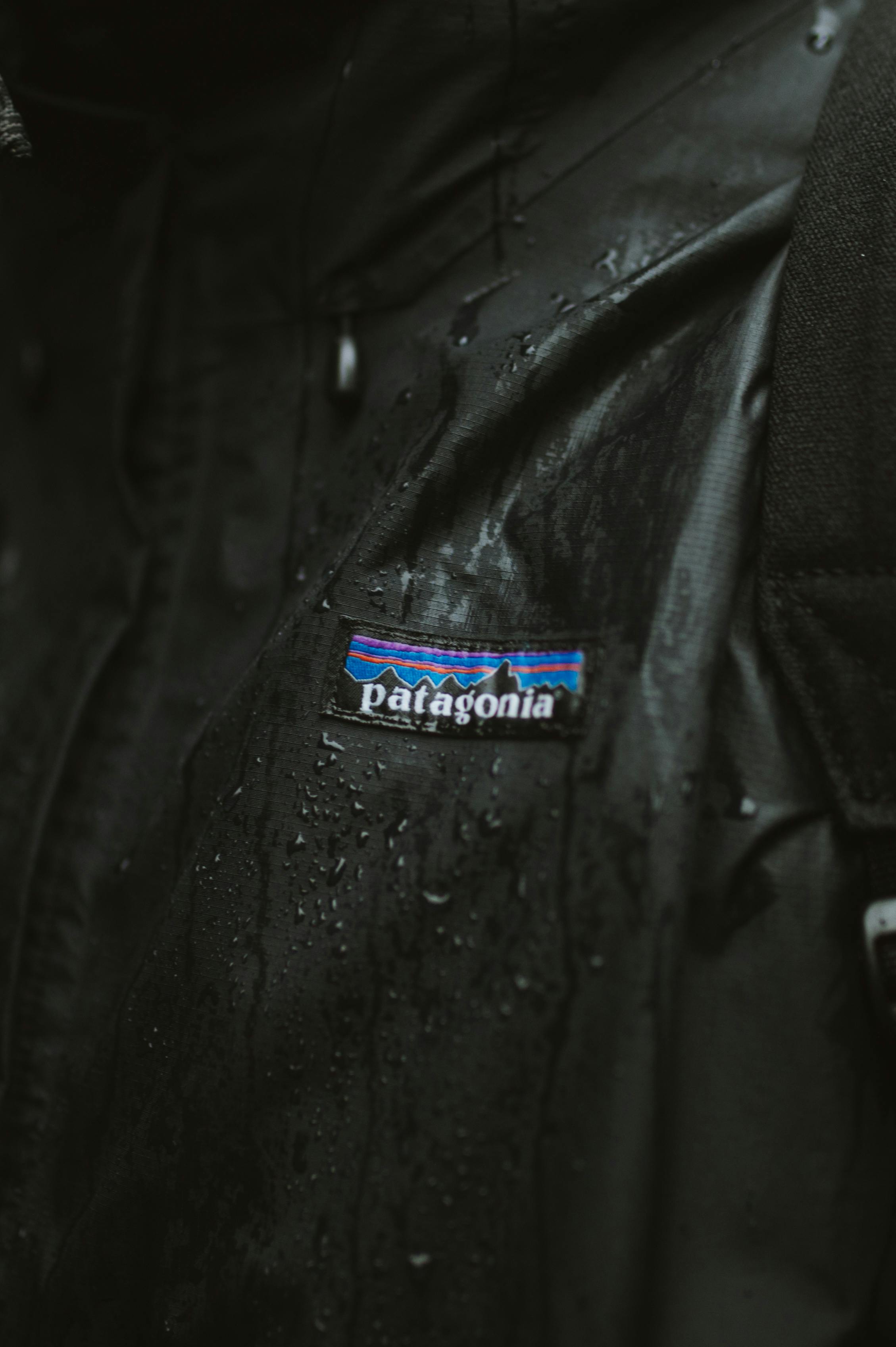 logo on a black wet jacket