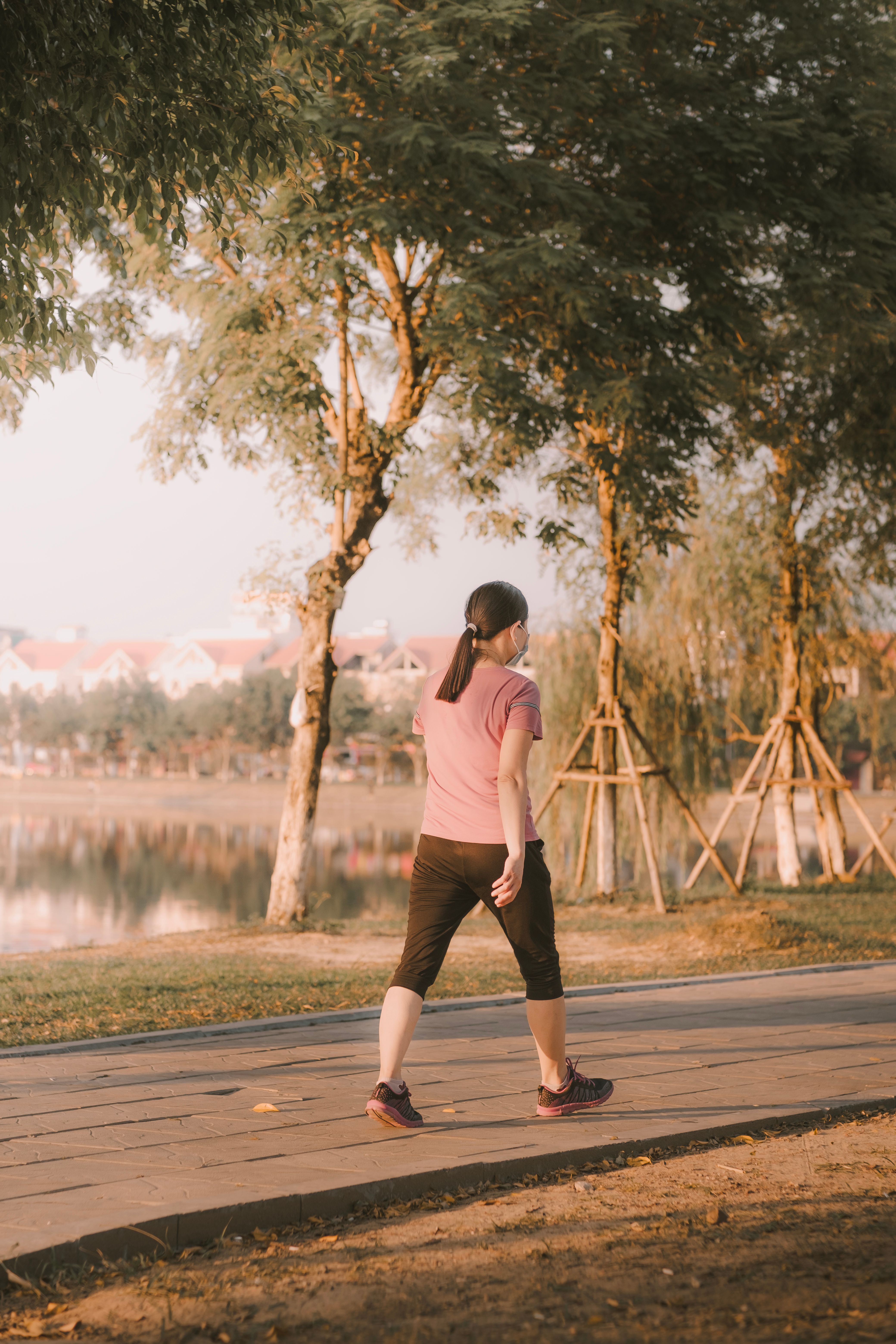 Back View of a Woman in a Forest · Free Stock Photo