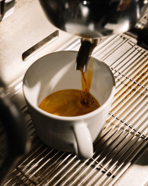 Close up of Pouring Coffee to Cup