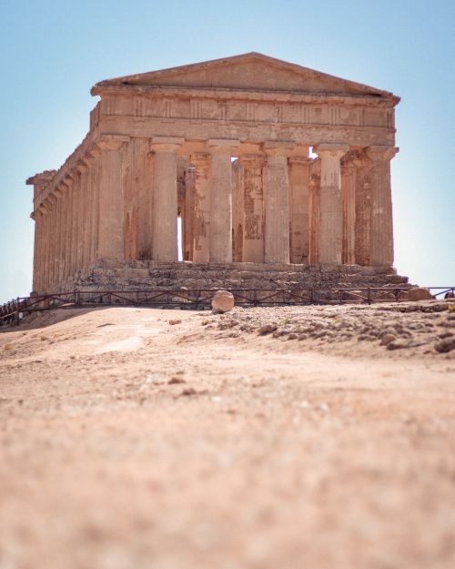 Free Discover the stunning ancient Greek temple in Agrigento, Sicily, basking under the sun. Stock Photo