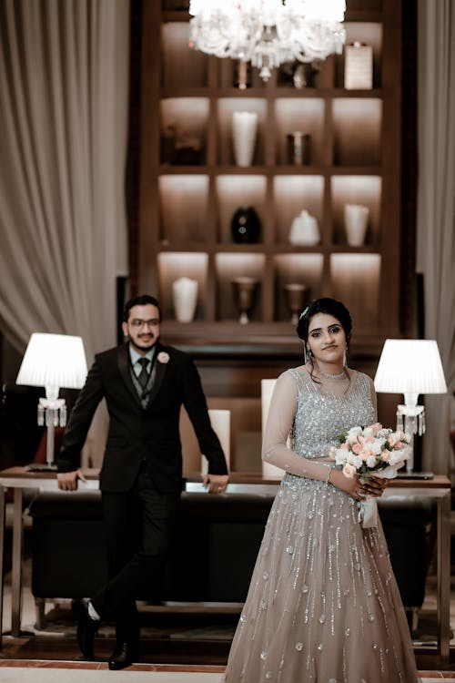 Newlyweds Posing in Wedding Dress and Suit