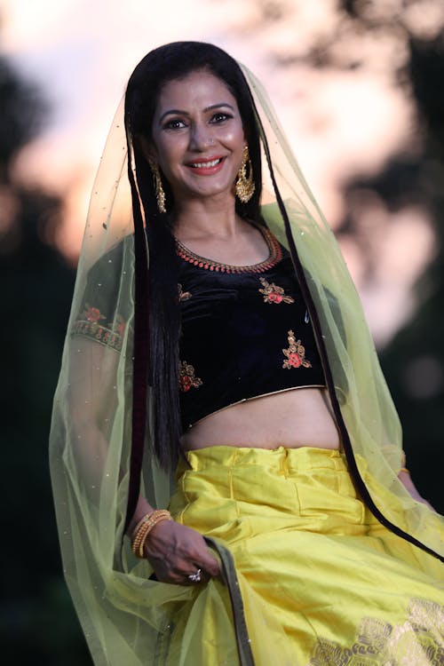 Portrait of Smiling Woman in Traditional Clothing