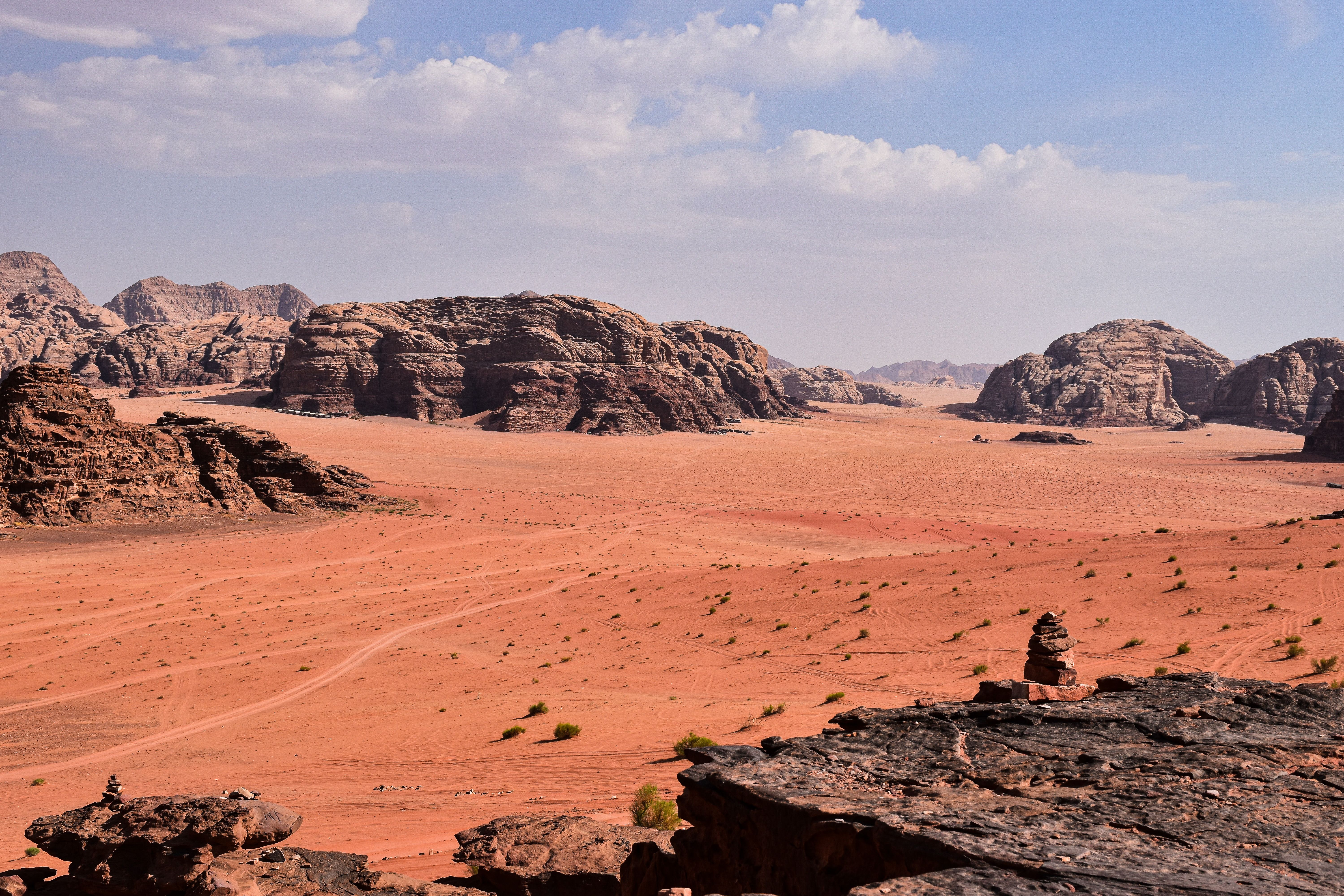 Stunning view of rock formations in Jordan's red desert, ideal for travel and nature themes.