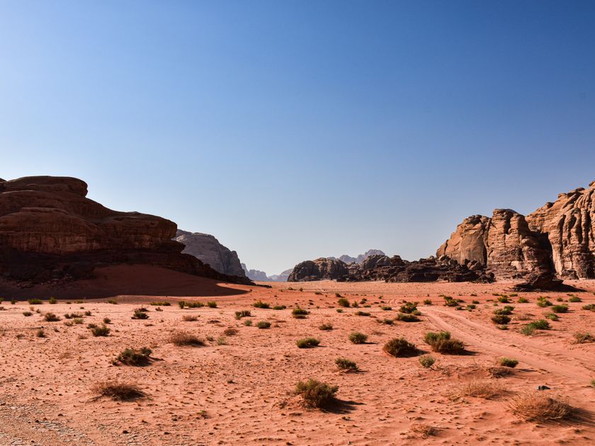Wide view of the Wadi Rum valley's iconic rock formations