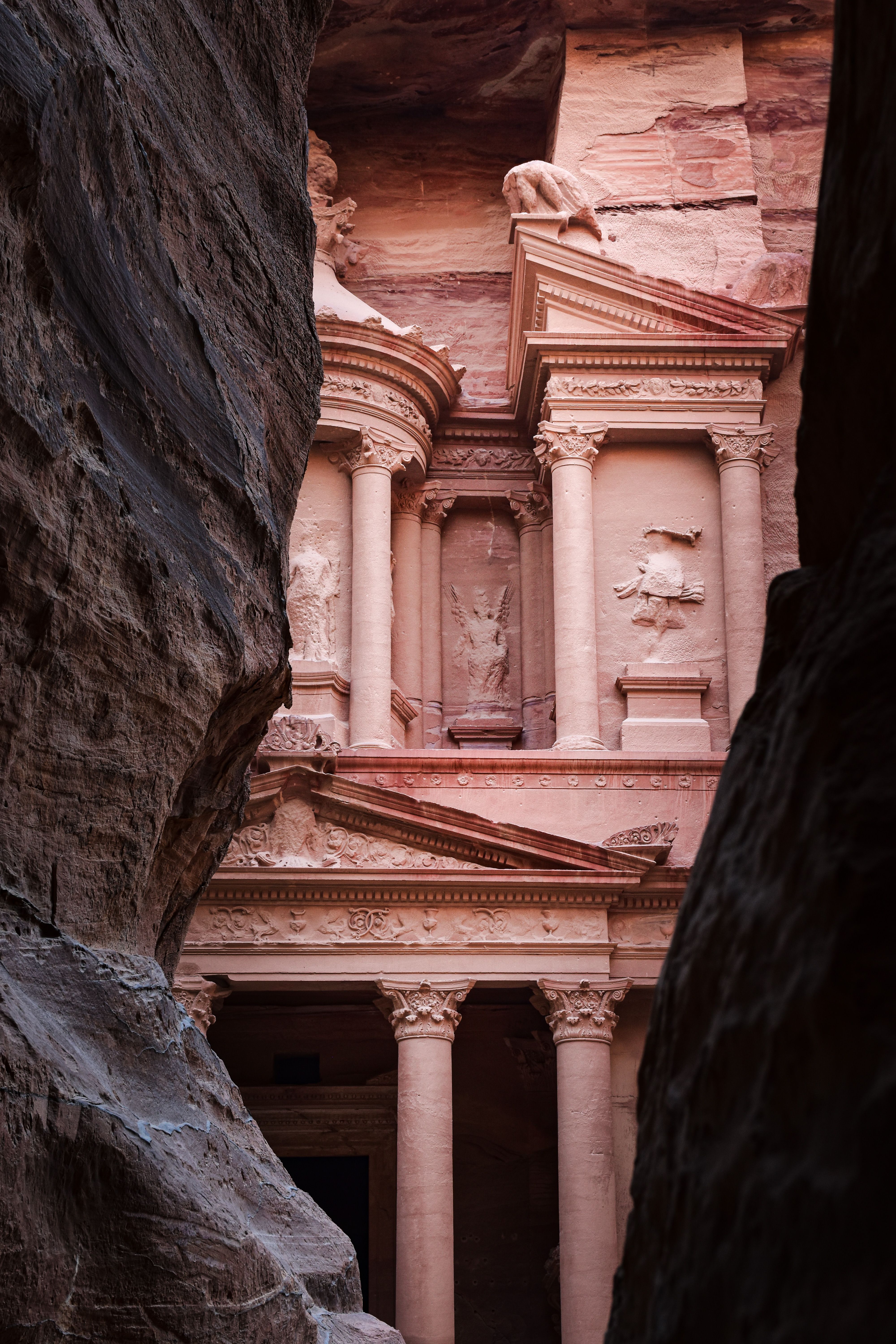 Scenic view of Petra's Al-Khazneh, a famous ancient rock-cut architecture in Jordan.