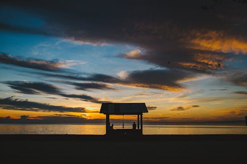 Бесплатное стоковое фото с берег, беседка, закат