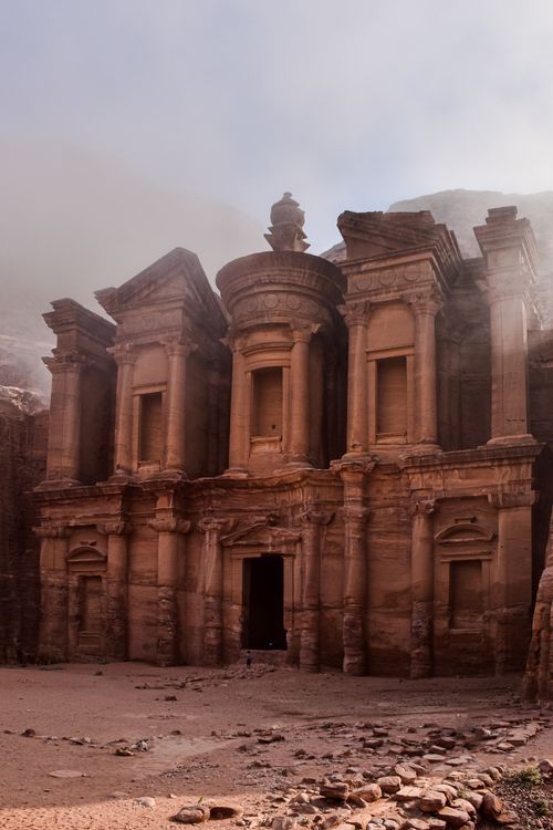Free Petra's magnificent Monastery, a historic wonder carved into rock cliffs in Jordan. Stock Photo