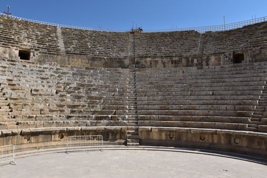 Explore this ancient Roman amphitheater in Jerash, showcasing stunning stone architecture.