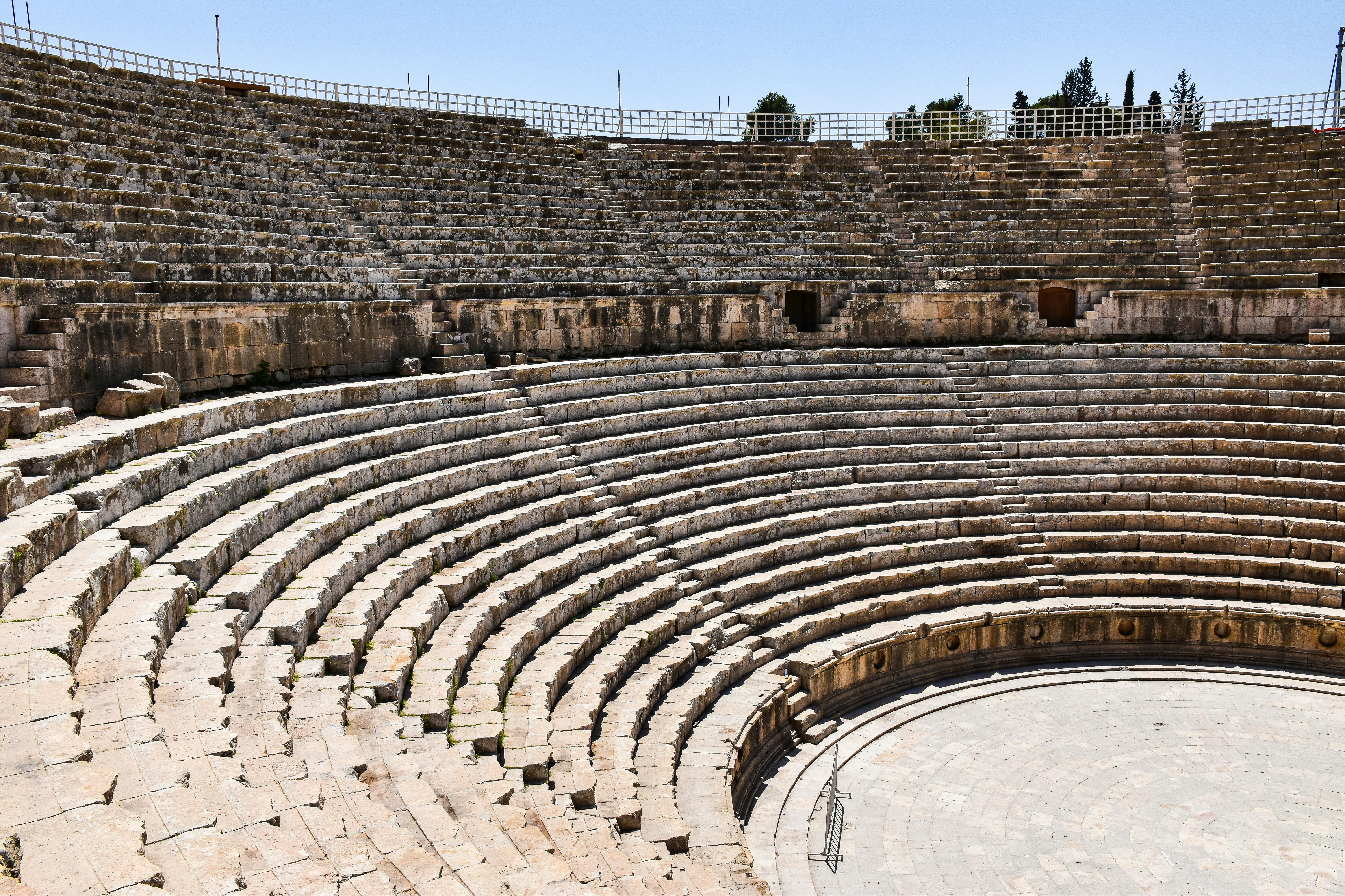 Explore the historic Roman amphitheater ruins in Jerash, Jordan, showcasing ancient architecture.