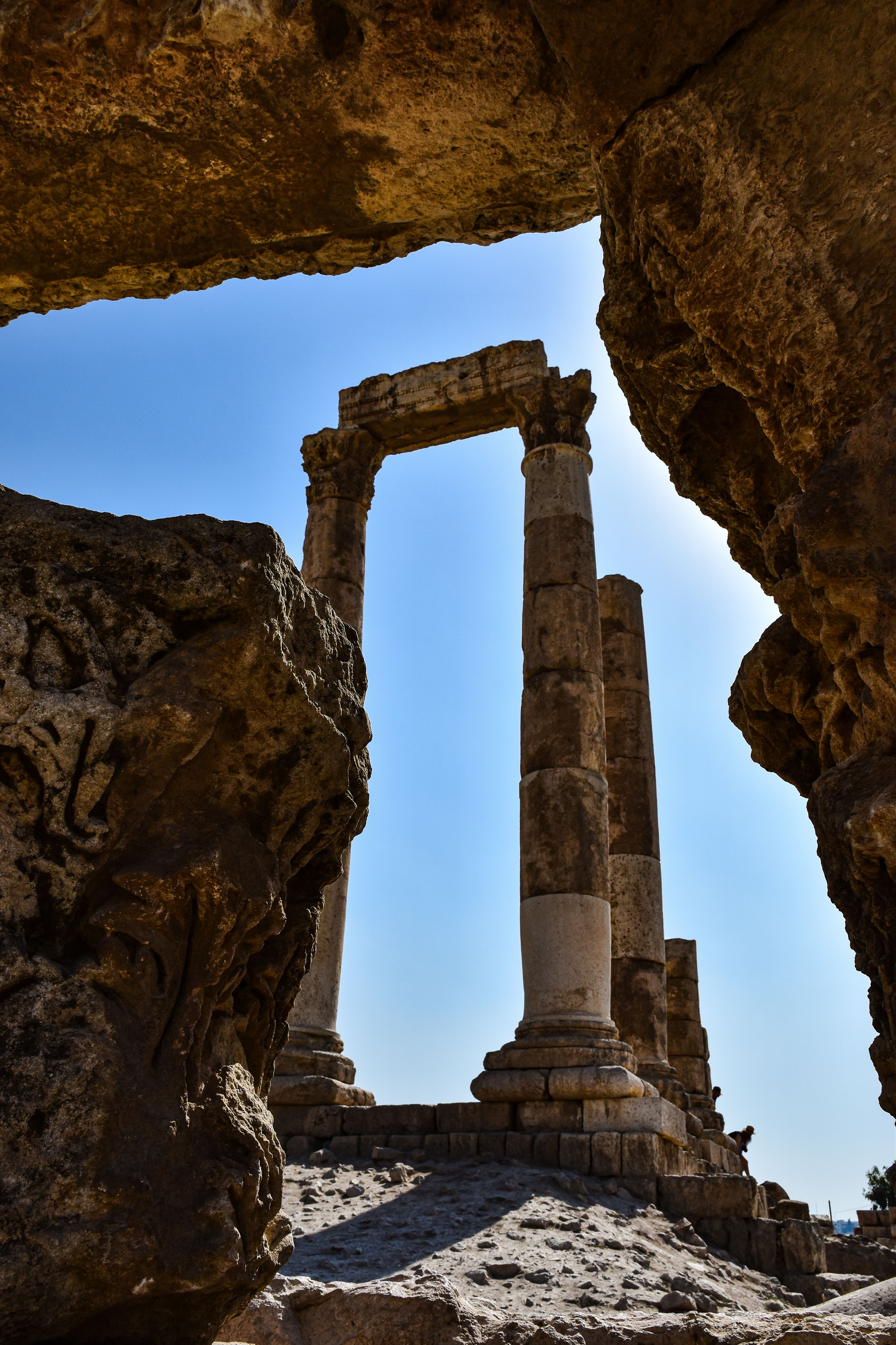 Columns behind Rocks in Jordan · Free Stock Photo