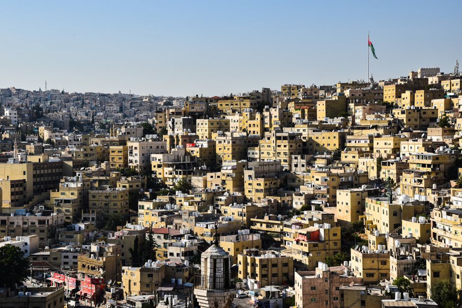 A Careem taxi driving on a street in Amman, Jordan