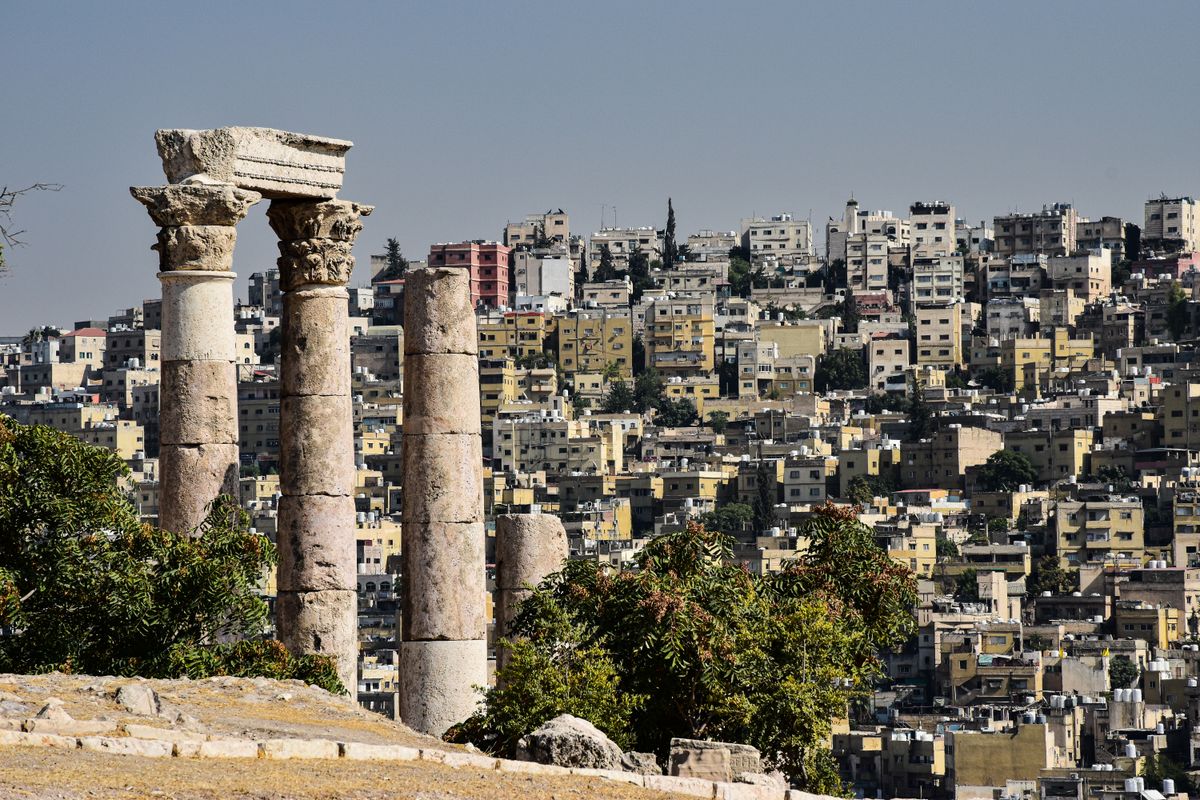 Roman citadel columns above the hillside cityscape of Amman