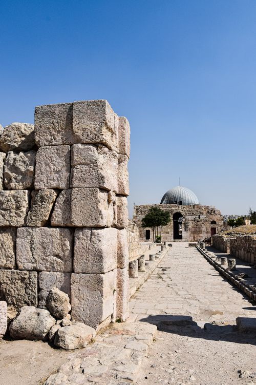 Free Historic Umayyad Palace ruins in Amman, Jordan with clear blue skies. Stock Photo