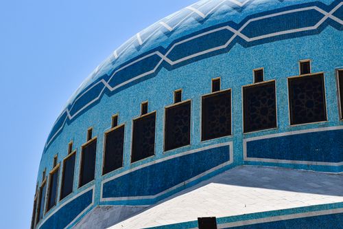 Free Stunning close-up of the blue dome of King Abdullah I Mosque in Amman, showcasing intricate tile work. Stock Photo