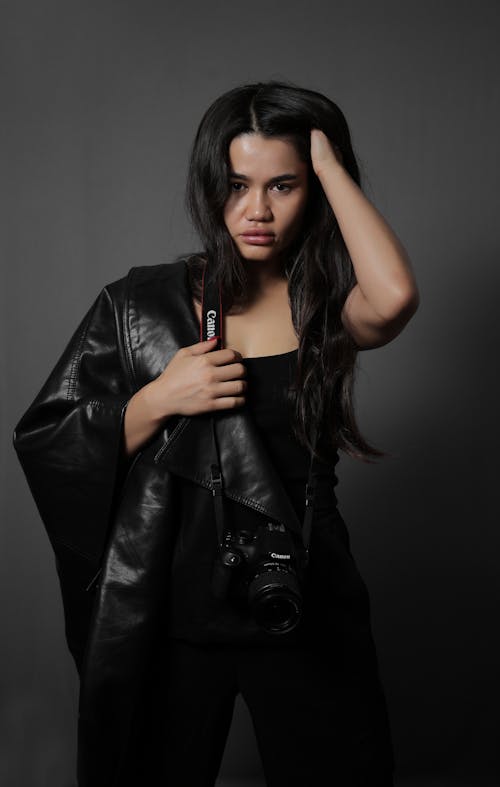 Young Woman in a Black Leather Jacket 