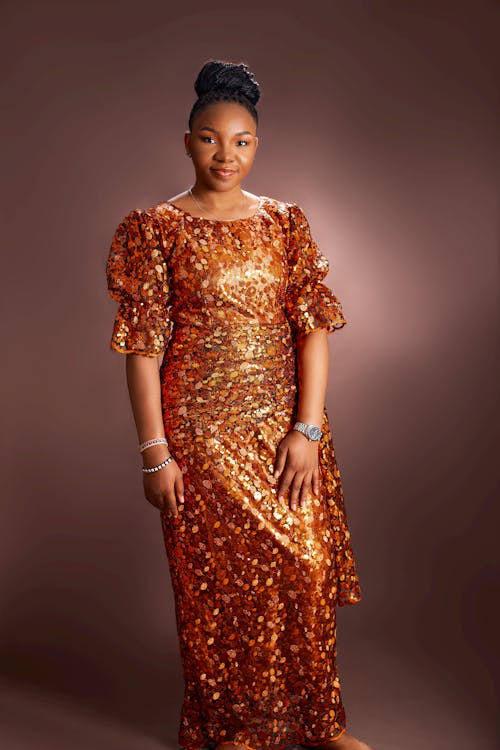 Elegant Woman in Golden Dress