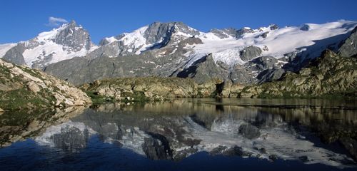 Free Beautiful mountain scenery with lake reflections in La Grave, France. Stock Photo