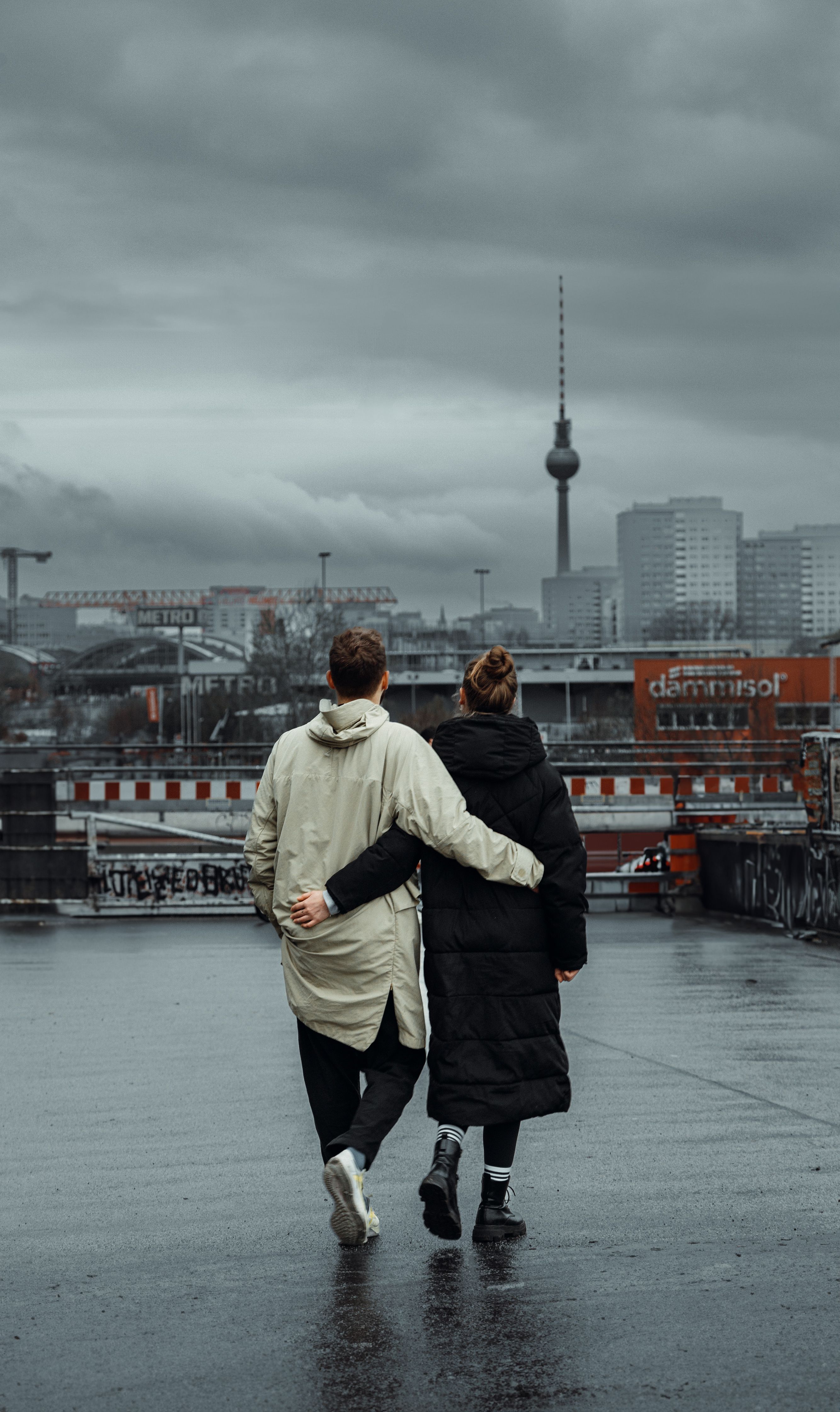 Back View of a Couple Walking on a Street · Free Stock Photo