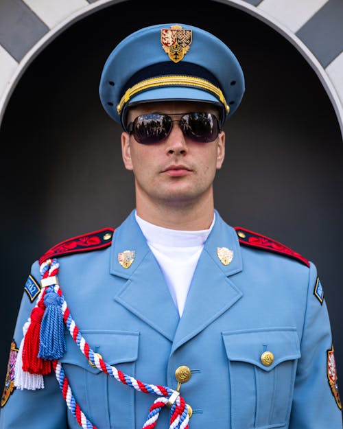 Portrait of Soldier in Sunglasses and Hat