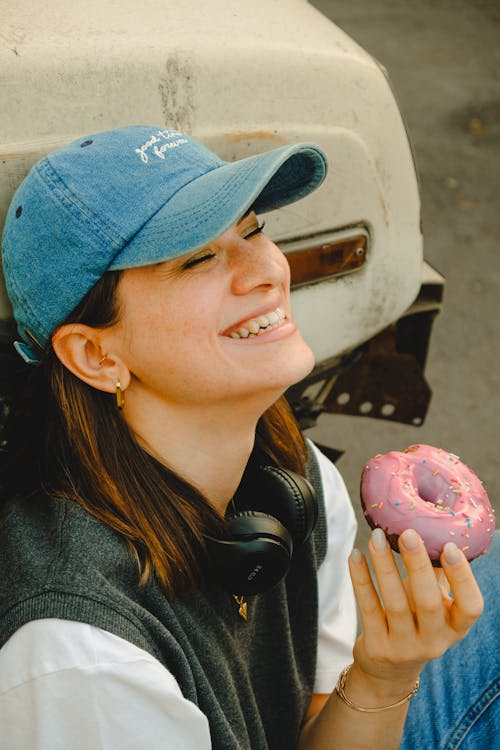 Smiling Woman with Donut