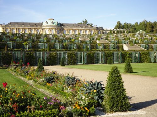 Free View of Sanssouci Palace and its vibrant gardens in Potsdam, Germany. Stock Photo