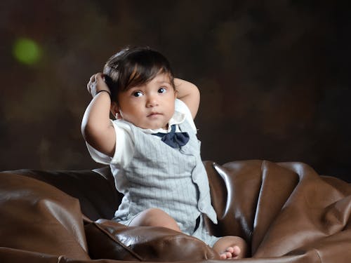 Free Studio Shot of a Little Boy Wearing Elegant Clothes  Stock Photo