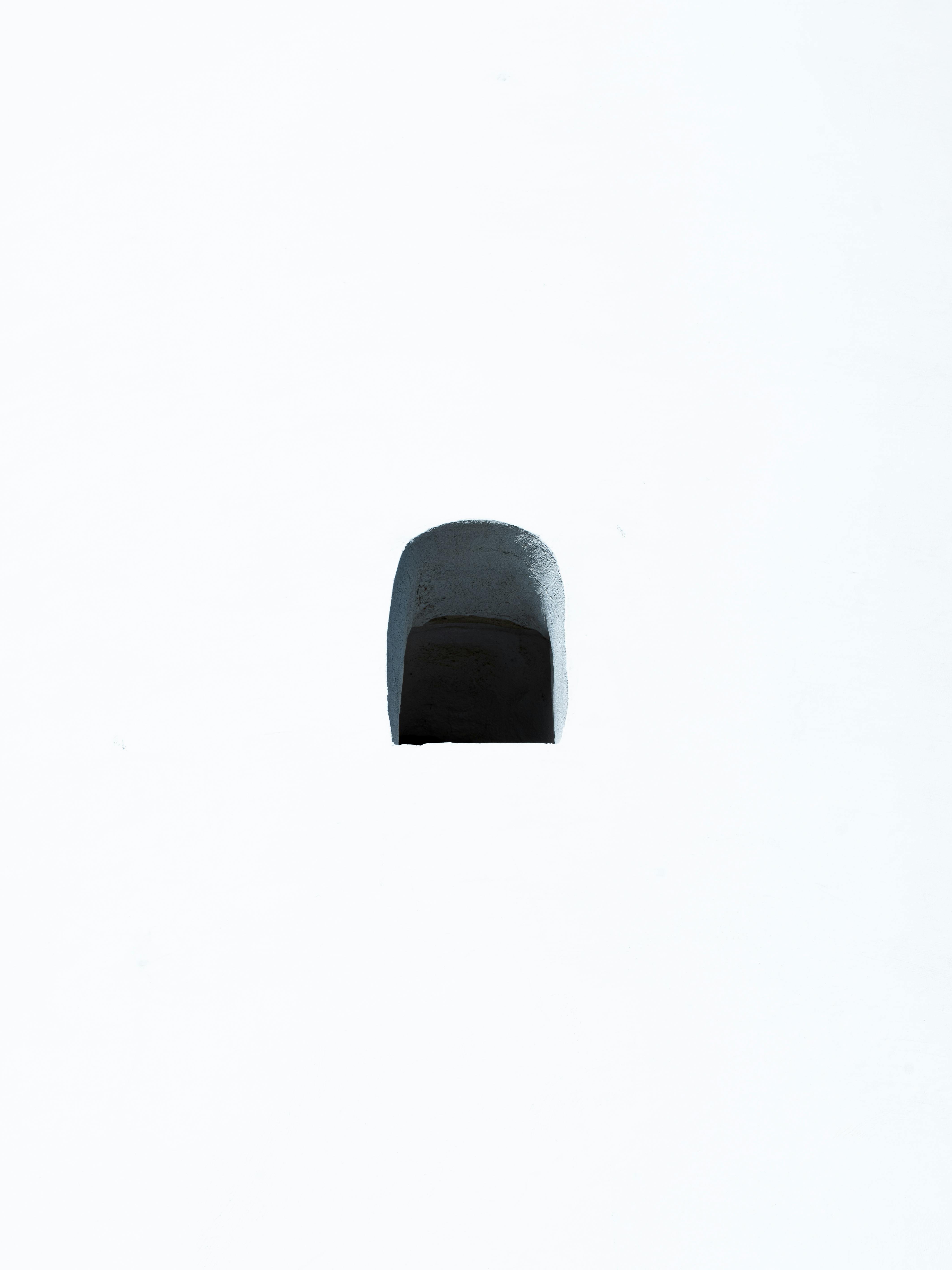 Free A minimalist portrayal of a singular window opening against a white backdrop in Anadolufeneri, Istanbul. Stock Photo