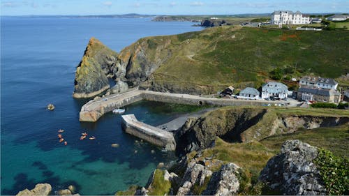 Village with Piers in Bay on Sea Coast