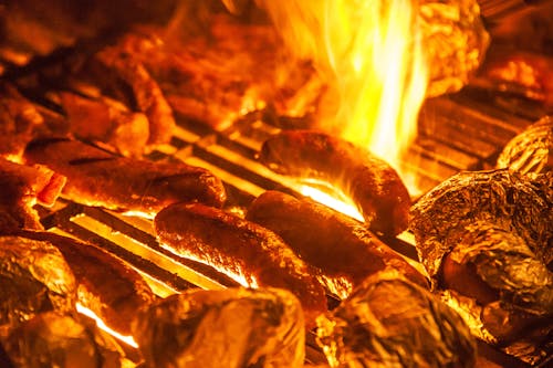 Sausages on Barbecue with Fire