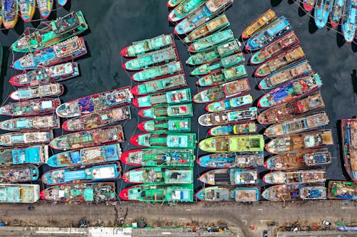 Boats Docked Near Pier