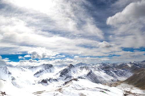 Бесплатное стоковое фото с горный хребет, горы, заснеженный