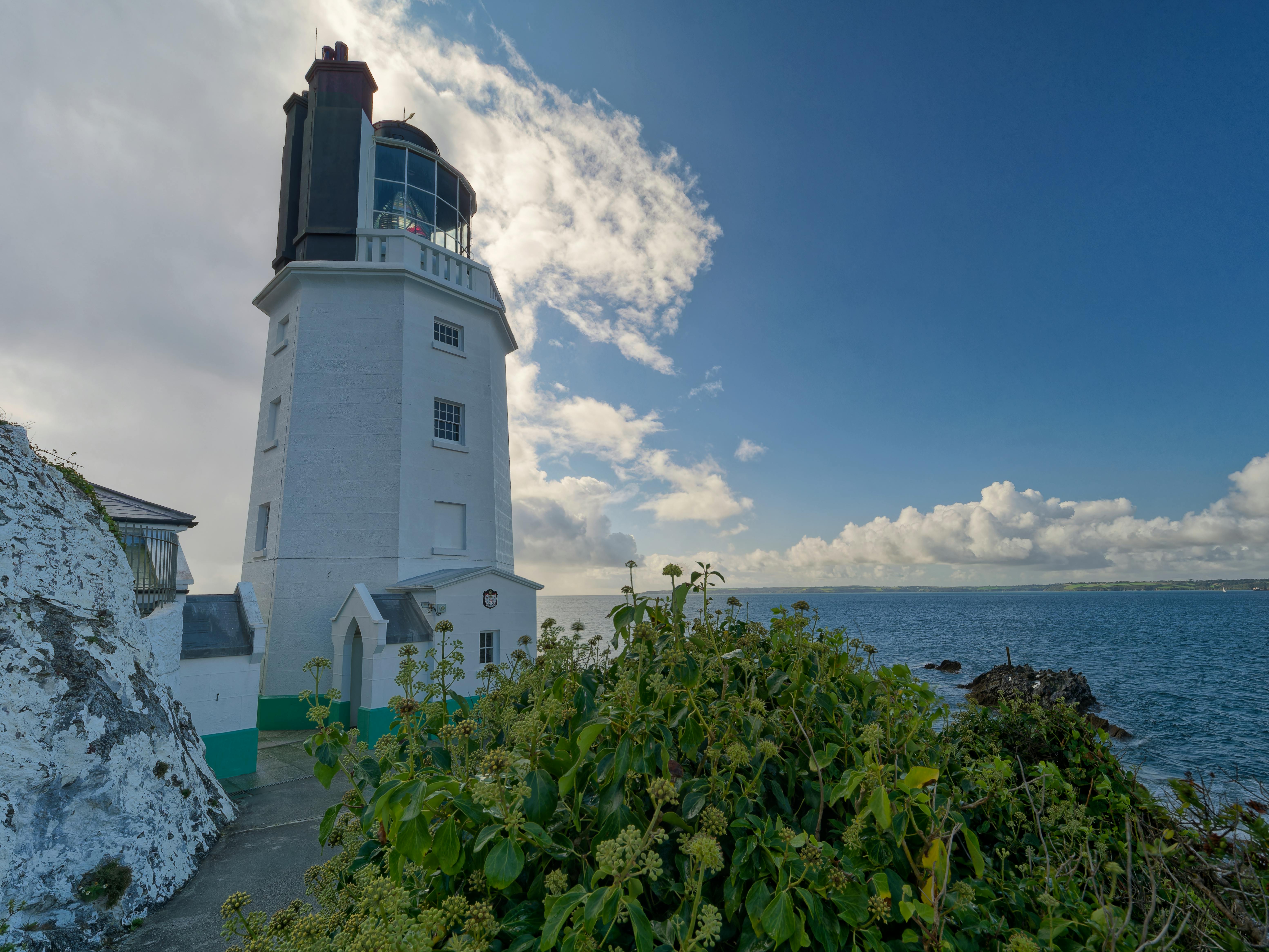 St Anthony Lighthouse stands tall on the Cornish coast, offering breathtaking oceanic views.