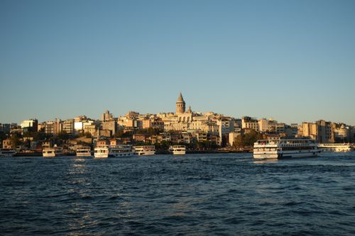 Free Beautiful cityscape of Istanbul featuring Galata Tower and waterfront during sunset. Perfect for travel imagery. Stock Photo