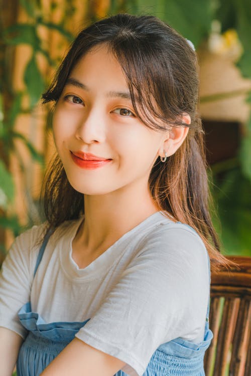 Portrait of a Pretty Brunette Smiling at the Camera